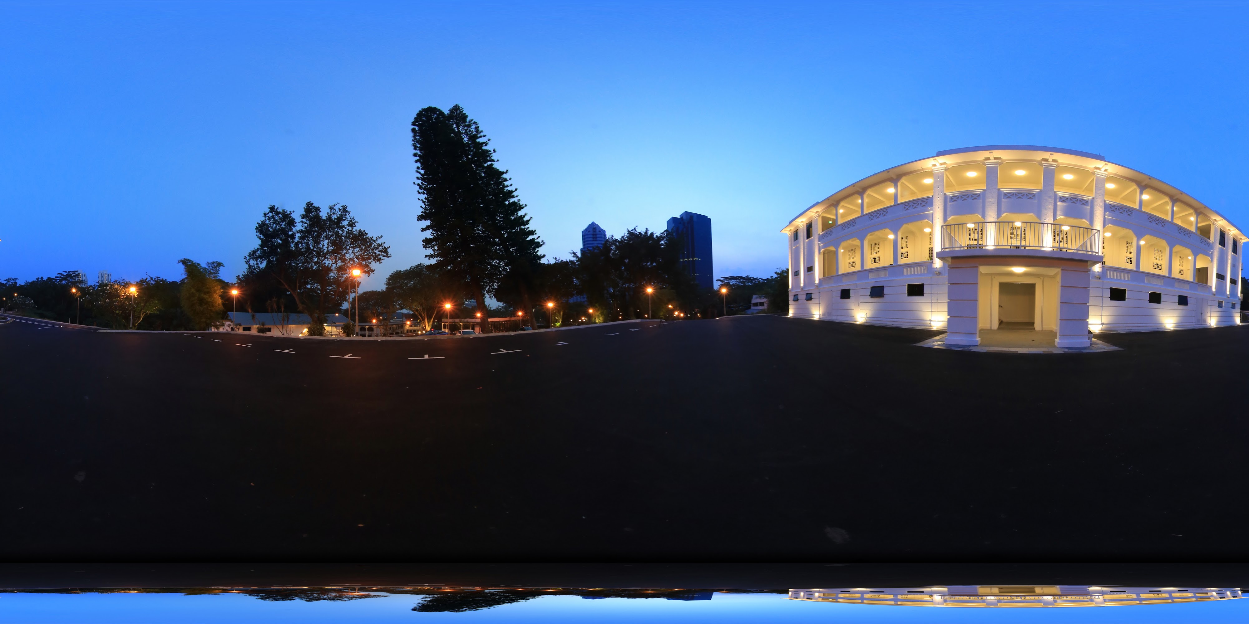Lit Circular Structure Nighttime Scene