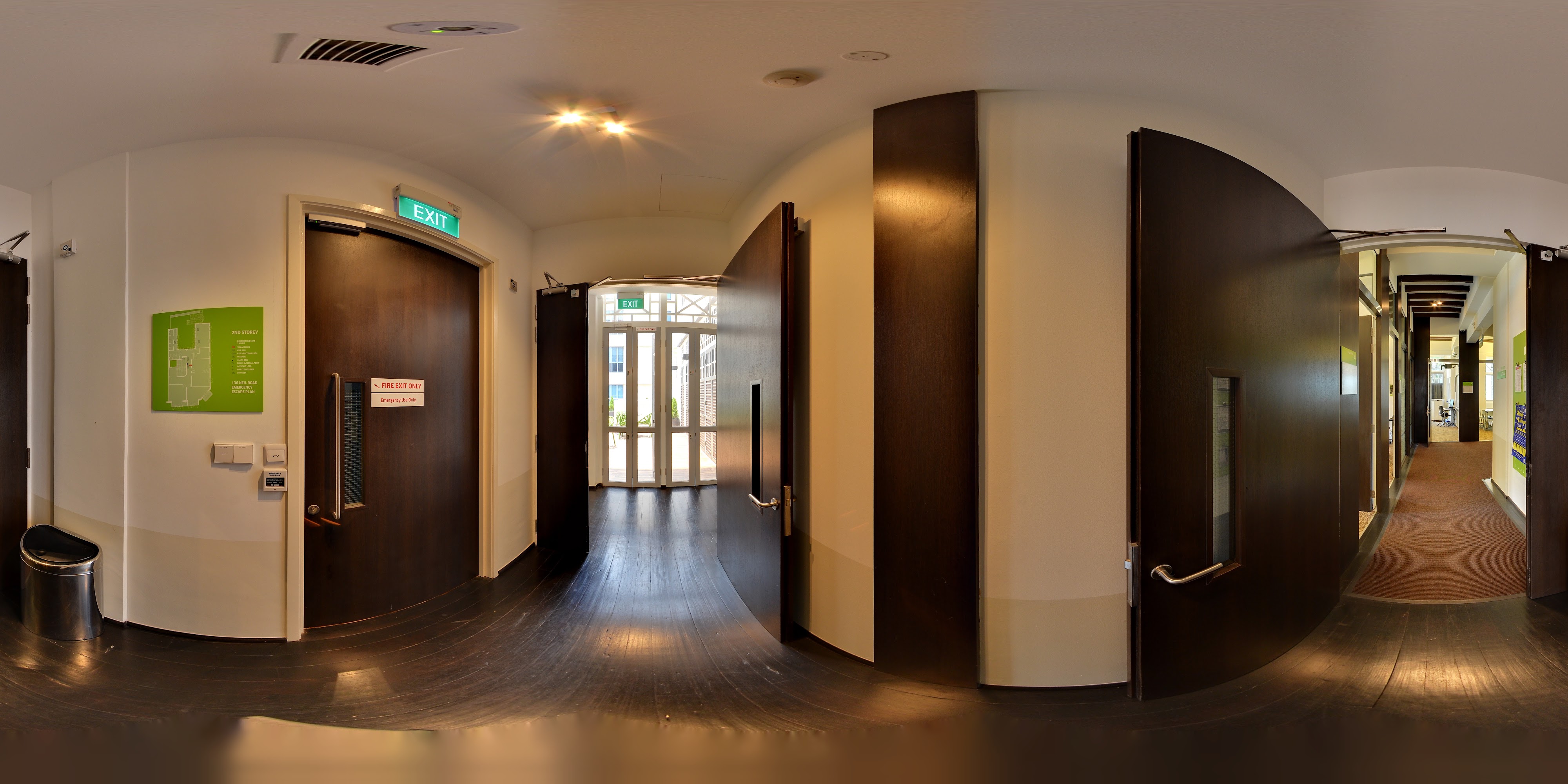 Contemporary Hallway with Exits