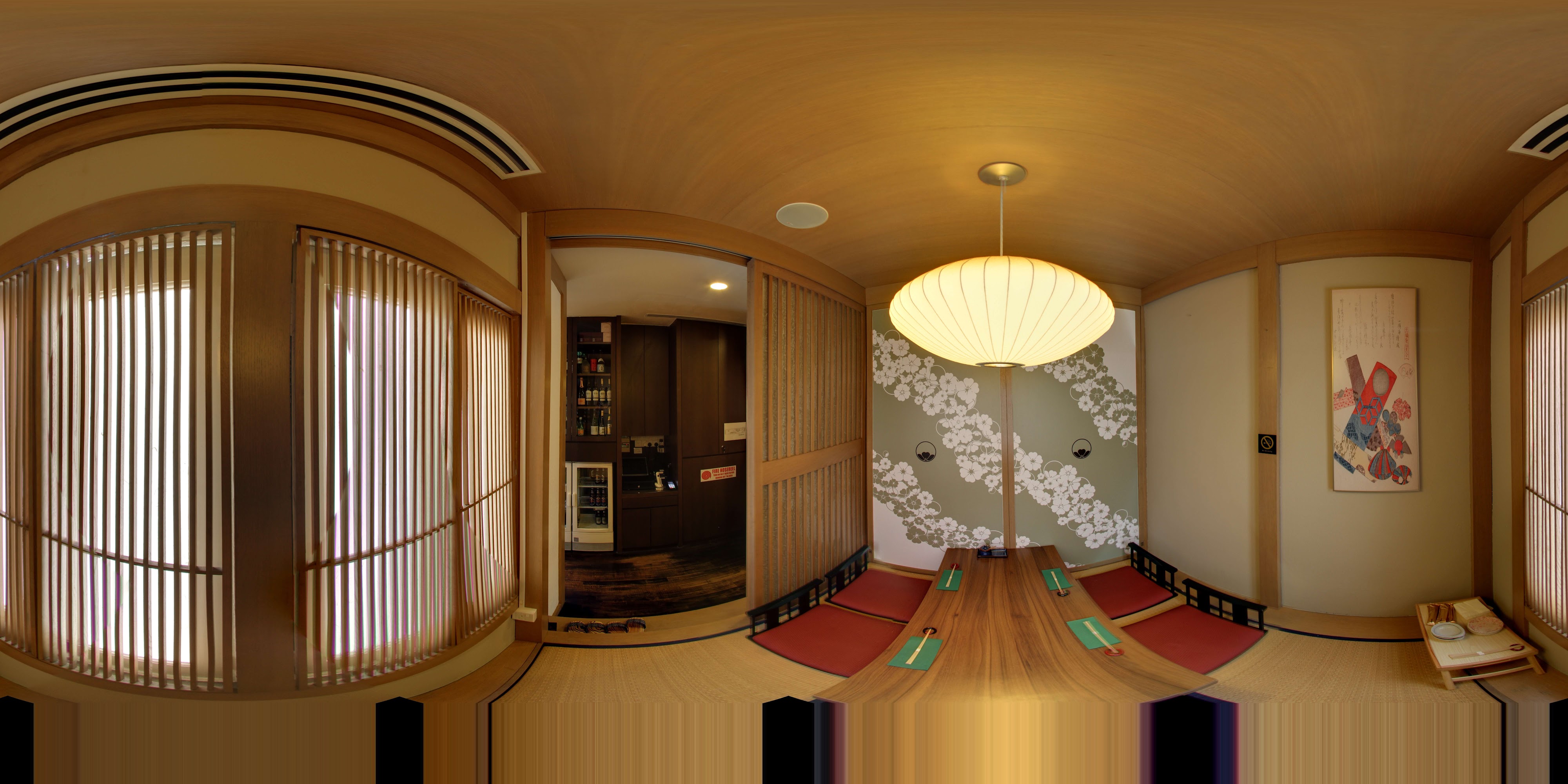 Traditional Room with Colorful Wall Art Near Sliding Doors