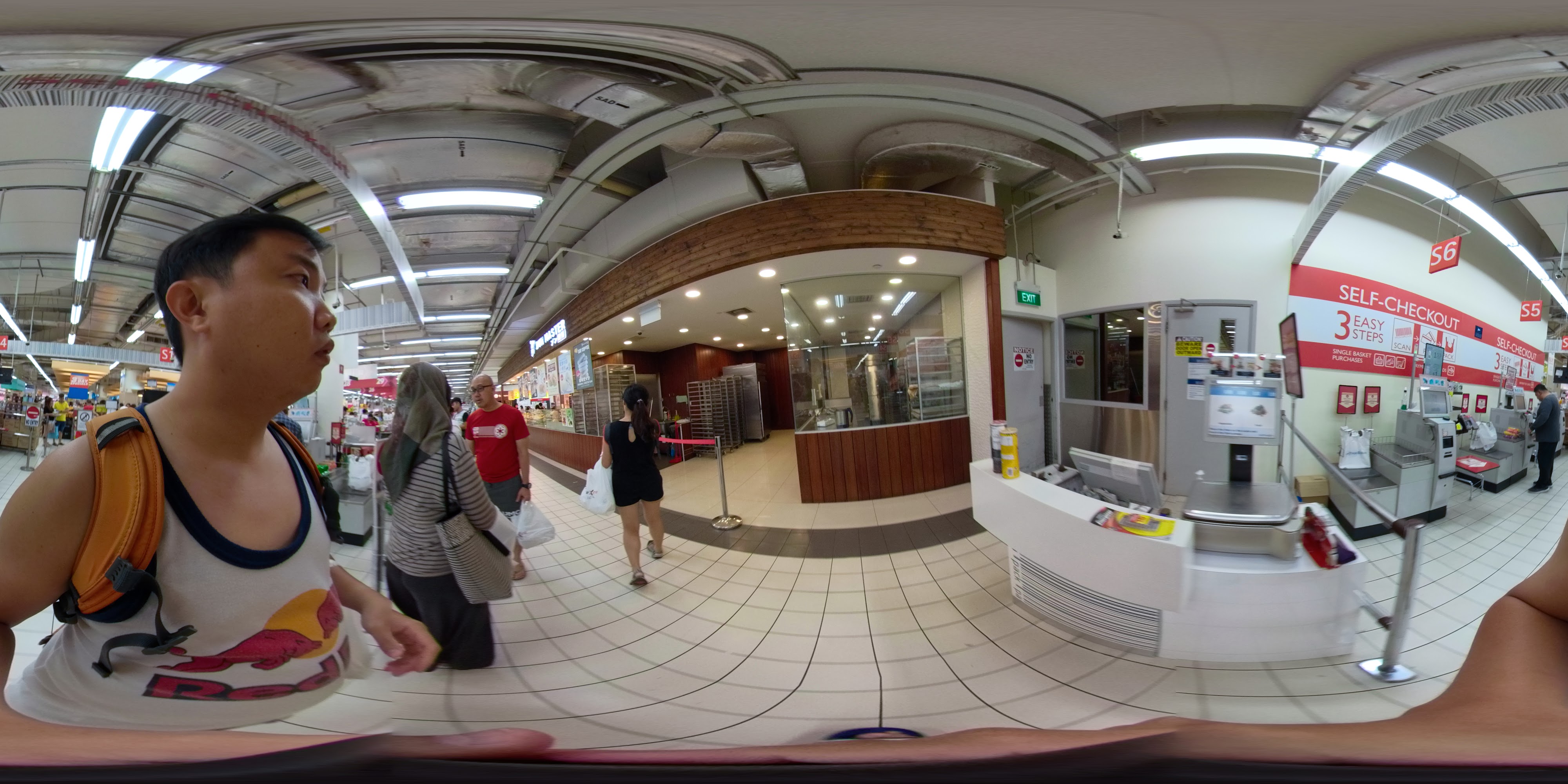 Bustling Supermarket Interior with Checkouts.