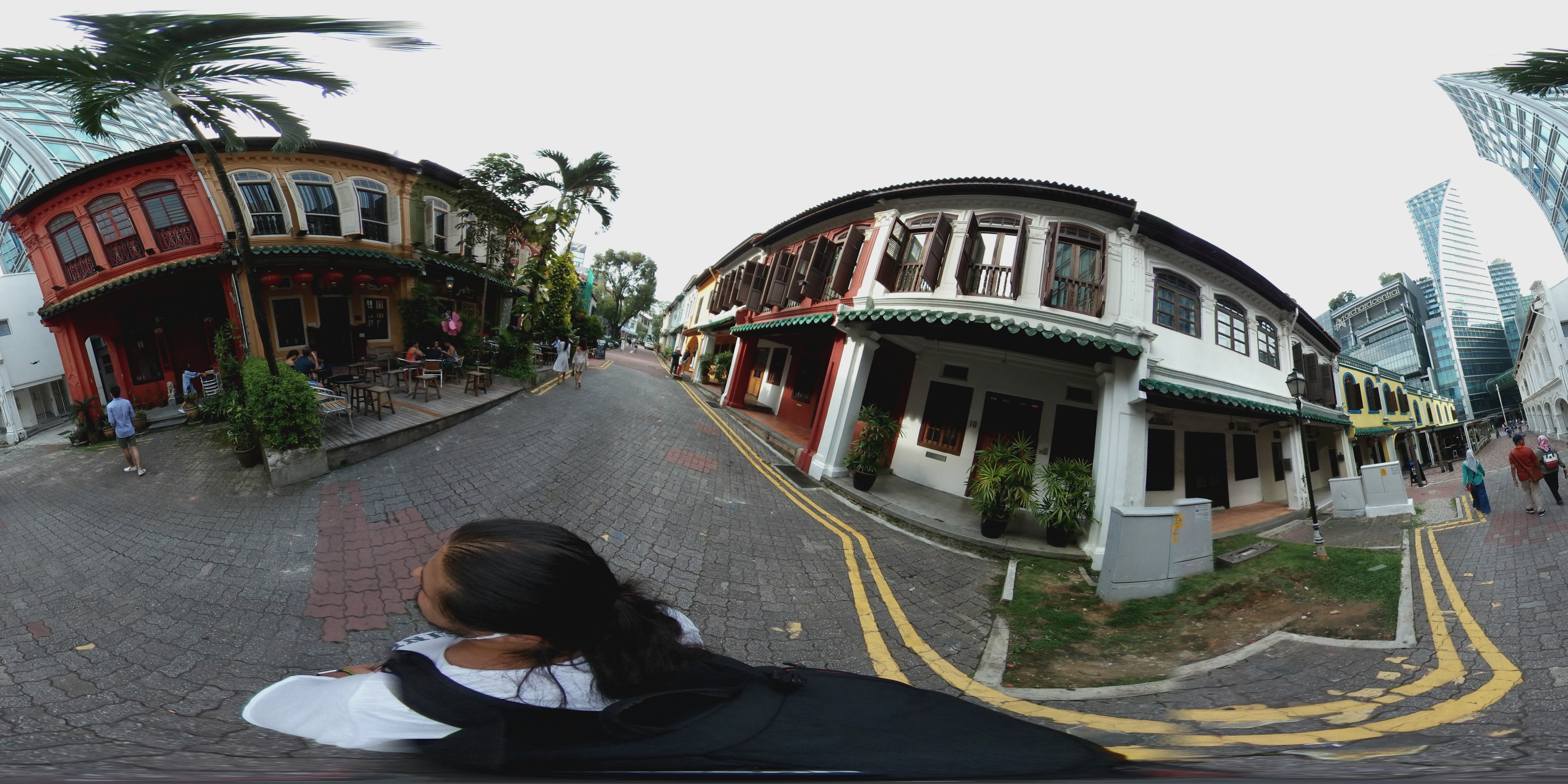 Curved colonial street buildings.