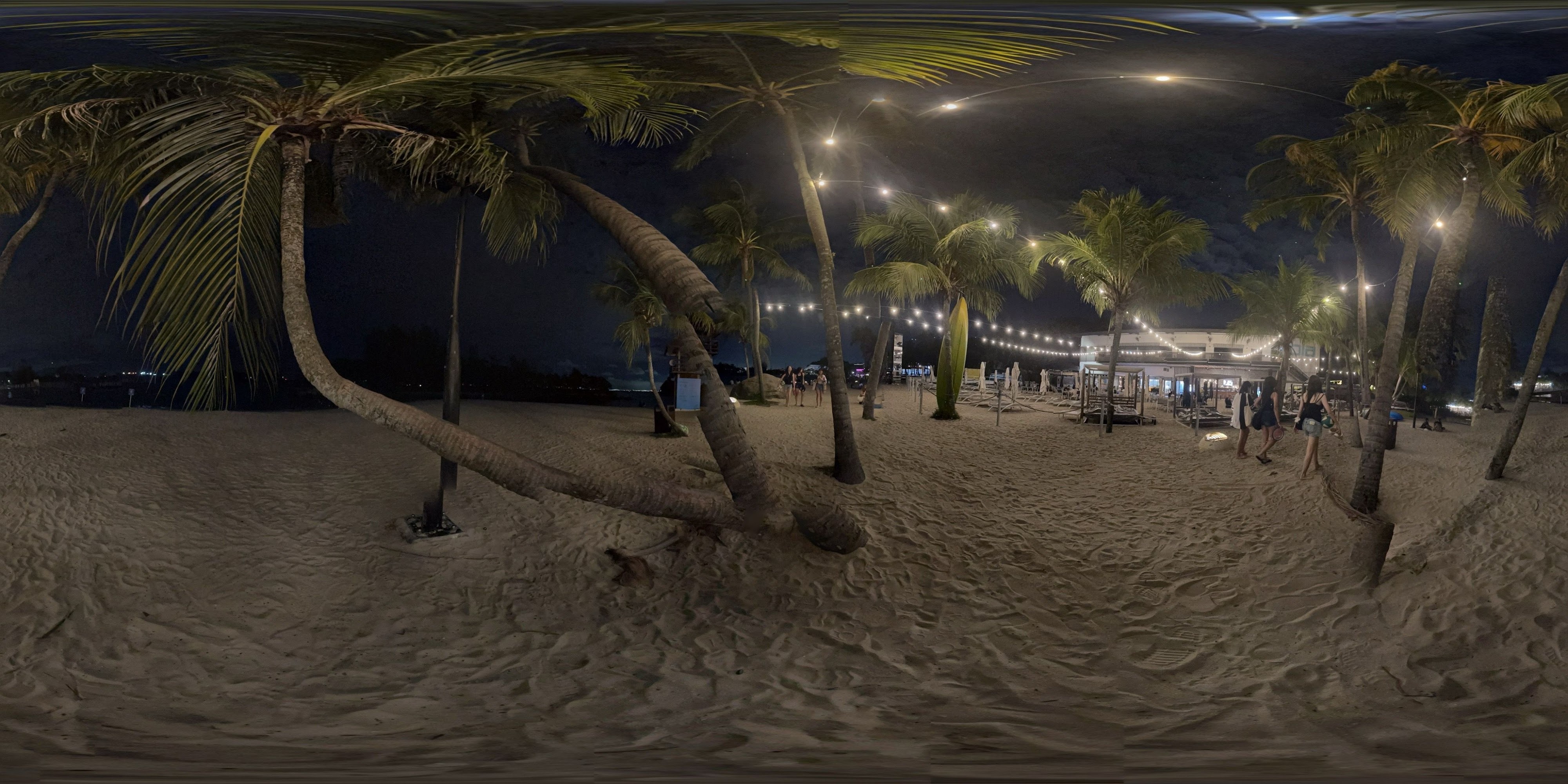 Lit Beach Under the Stars