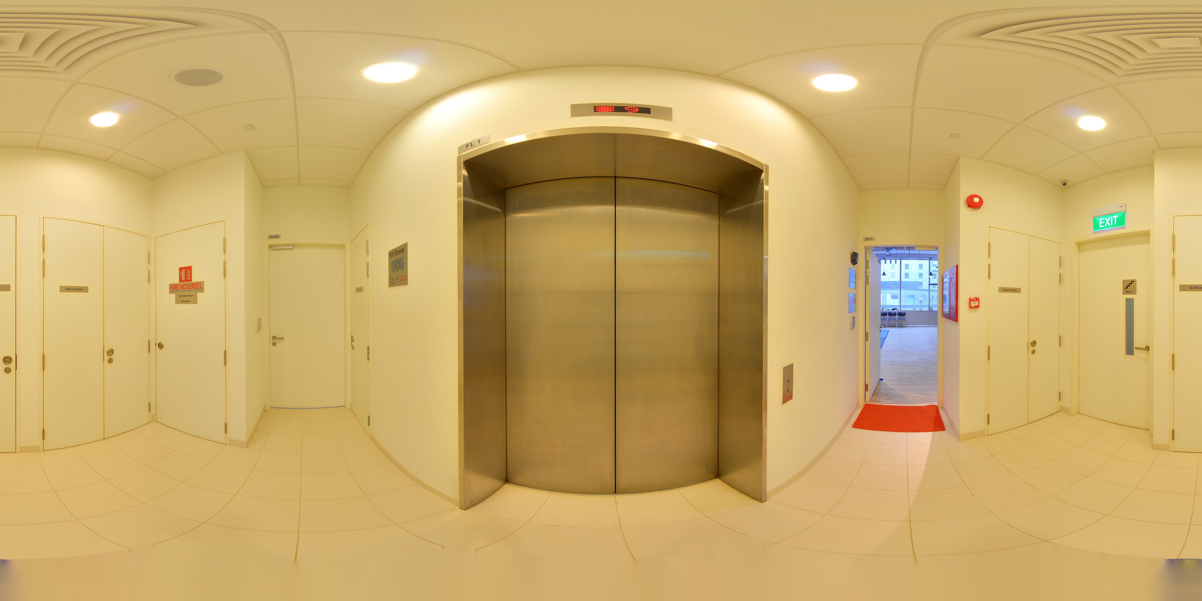 Hallway with Central Elevator