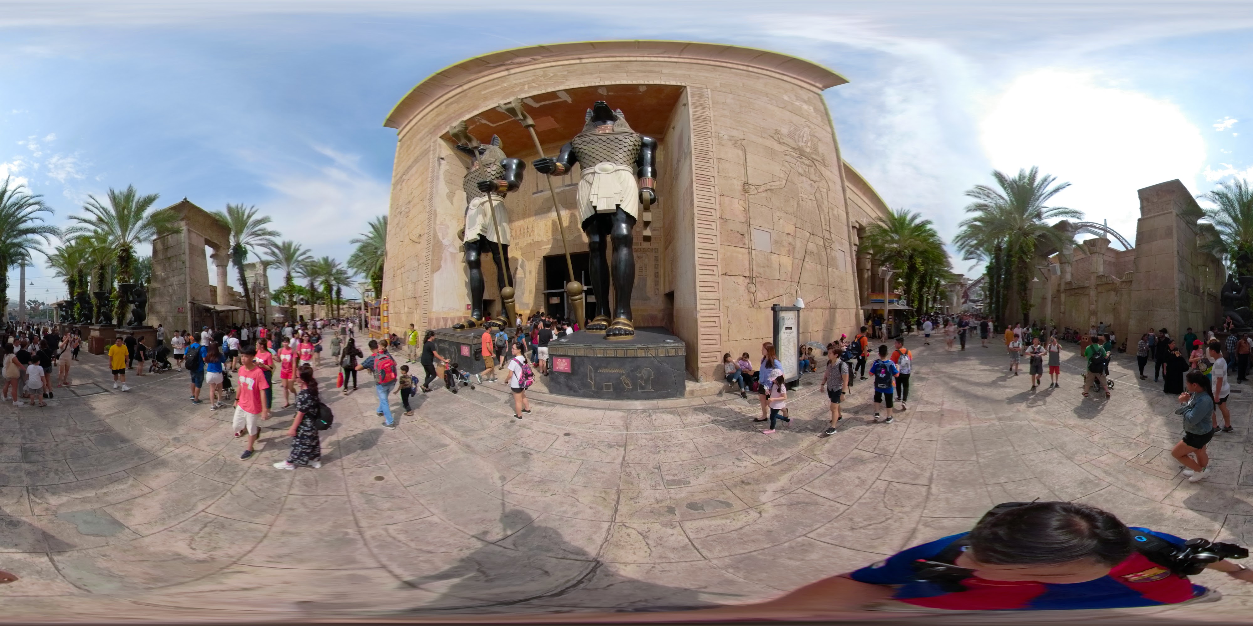 Ancient Statues and Crowd