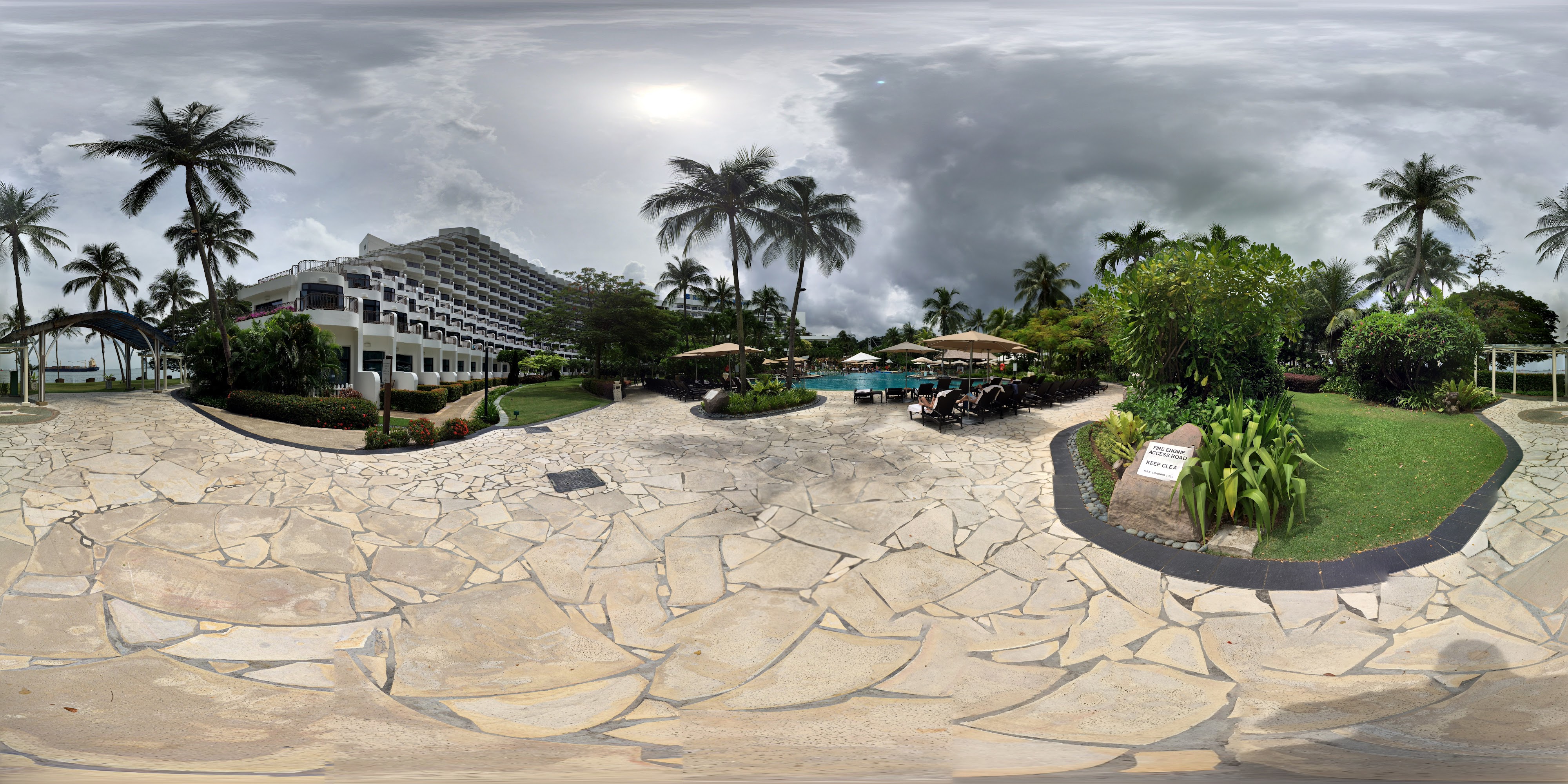 Serene Tropics and Paved Walkways